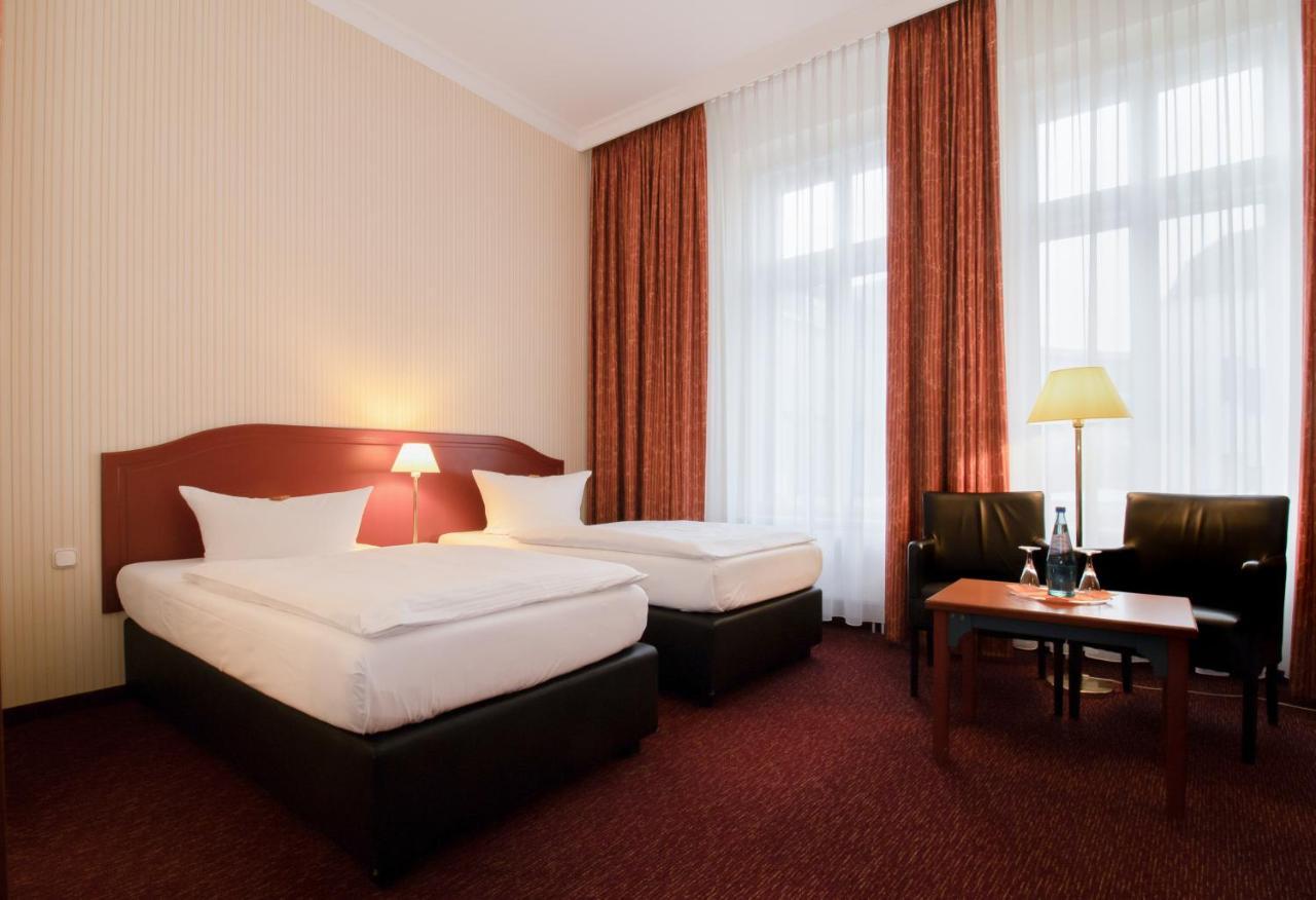 Akzent Hotel Am Goldenen Strauss Гёрлиц Экстерьер фото