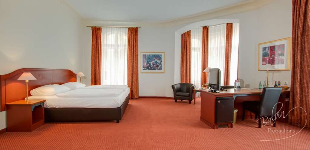 Akzent Hotel Am Goldenen Strauss Гёрлиц Номер фото